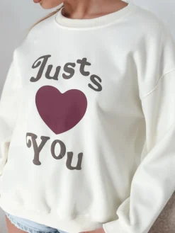 Bluzy Damskie>Dstreet Bluza damska oversize z nadrukiem JUST LOVE YOU beżowa BY1476